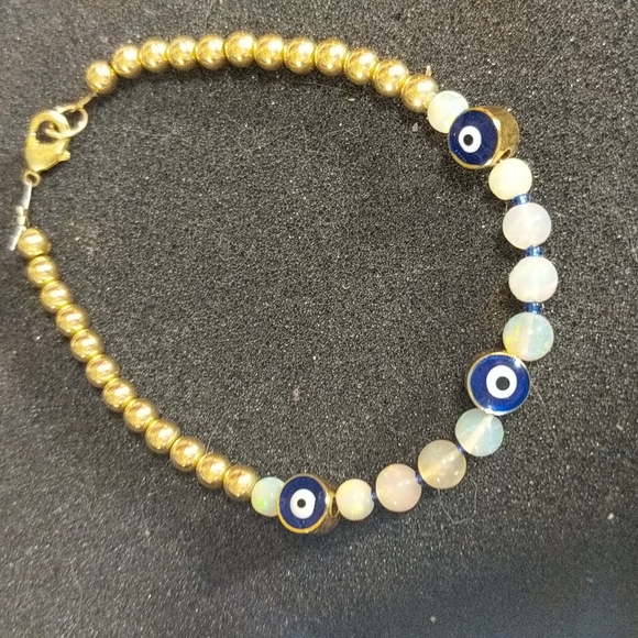 The evil protection eye 24 k gold and Ethiopian welo opal bracelet - Picture 1 of 8
